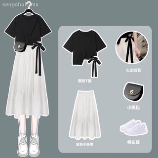 Verano nueva moda traje falda mujer estudiante coreano suelto camiseta de manga corta + falda blanca super hadas traje de dos piezas