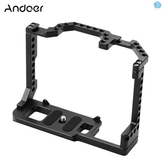 [COM] Andoer jaula para cámara de aleación de aluminio con tornillo de doble zapata fría de 1/4 pulgadas Compatible con cámara DSLR Canon EOS 90D/80D/70D