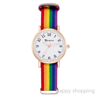 Reloj de cuarzo luminoso con correa de lona arcoíris para mujer