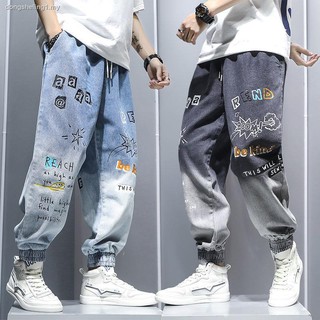Harlan marea de la marca de dibujos animados graffiti impresión gradiente jeans versión masculina de suelto casual pantalones hip-hop pantalones masculinos