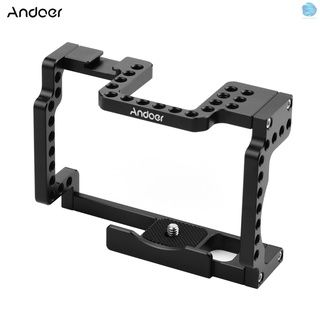 [COM] Andoer cámara jaula Rig aleación de aluminio con zapata fría 1/4 hilo Compatible con cámara Canon M50 sin espejo