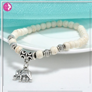 Disponible en inventario pulsera elástica de Tibet con colgante de elefante y turquesa blanco elegante joyería