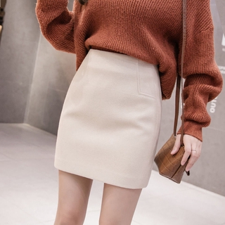 Cintura alta lana falda corta de las mujeres otoño e invierno grande una línea de falda engrosada suelta falda de cadera pequeña falda de un paso