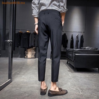 Pantalones de traje pantalones casuales para hombres pantalones rectos sueltos de nueve puntos para hombres otoño e invierno versión coreana de la tendencia de los pantalones delgados
