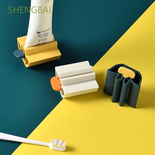Shengbai exprimidor Manual de pasta de dientes prácticos accesorios de limpieza de dientes suministro de baño Clip-on hogar plástico hogar fácil de usar prensa dispensador de limpiador Facial/Multicolor