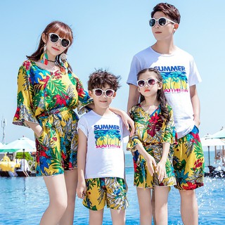 Playa familia conjunto T-shirt hijo mar mamá verano coincidencia hija papá pantalones cortos Look nuevo vacaciones