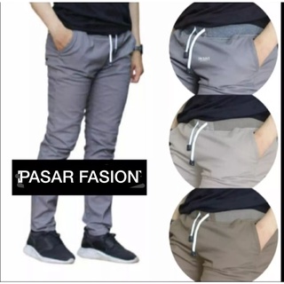 Pantalones largos chinos rip llanura goma cintura hombres distribución calidad