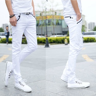 Pantalones casuales blancos elásticos de otoño / invierno para hombres Versión coreana de la tendencia de los pies ajustados para hombres pantalones deportivos para niños pantalones largos