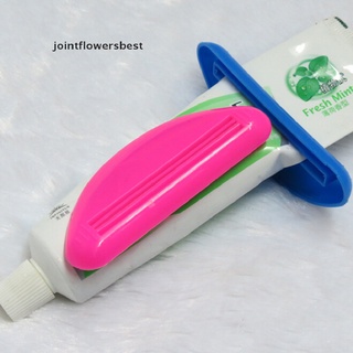 jfmx 2 piezas dispensador de tubo de exprimir exprimidor fácil prensa pasta de dientes herramienta segura para el hogar (2)