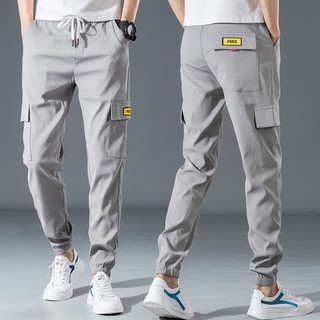 Mono de los hombres de verano delgada cintura pantalones de moda de la marca suelta estudiante de nueve puntos pantalones coreanos slim casual pantalones de los hombres