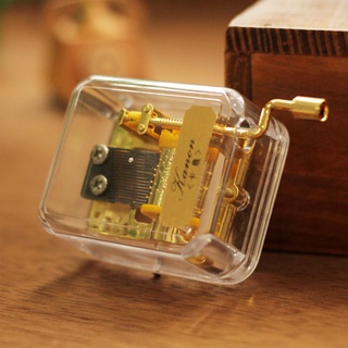Caja de música cuadrada transparente portátil