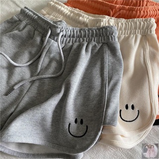 Pantalones cortos deportivos sonrientes para mujeres estudiantes de verano nuevo desgaste suelto una palabra piernas anchas salvaje casa caliente pantalones