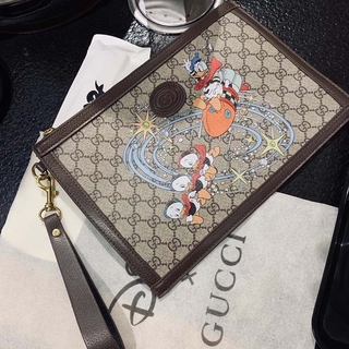 Gucci bolso de embrague para hombres y mujeres nueva Baita Disney Co-marca cartera moda tendencia gran capacidad embrague al aire libre ocio bolsa de compras